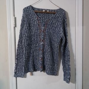 Blue sweater with brown cord detail